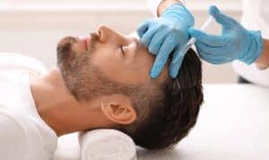 Man getting PRP injections for hair loss in Boca Raton, FL
